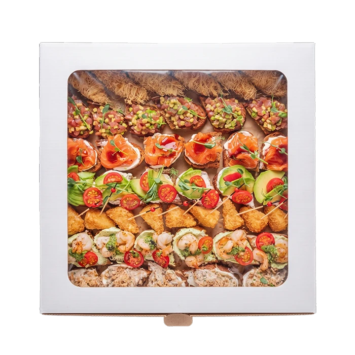ссорти холодных закусок, канапе и десертов для фуршета